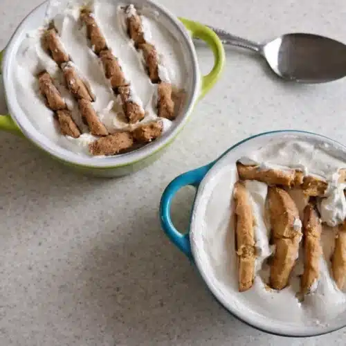 Japanese Yogurt Cheesecake Variations: Easy No-Bake Flavors That Always Set 2 A glass jar filled with Japanese yogurt cheesecake base, showing yogurt and biscuits